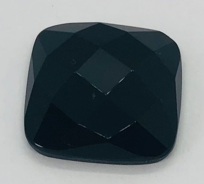 Obsidian cabochon in the shape of a faceted square