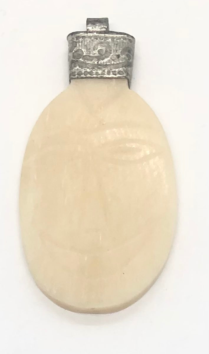 Pendant. Indian Small Oval Face